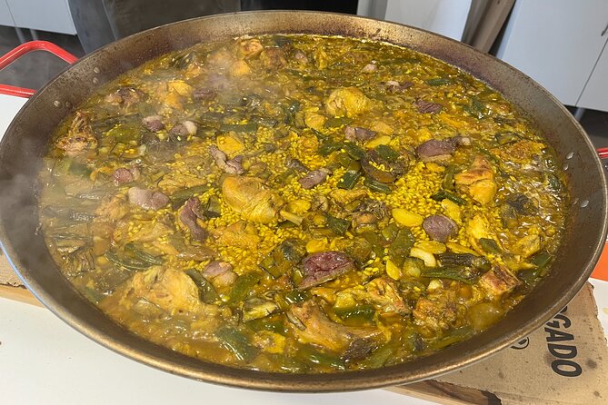 Valencian Paella class with welcome drinks and tapas - Preparing Valencian Paella Step by Step